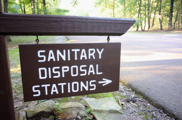 Close up of sanitary disposal stations sign in public state park campground